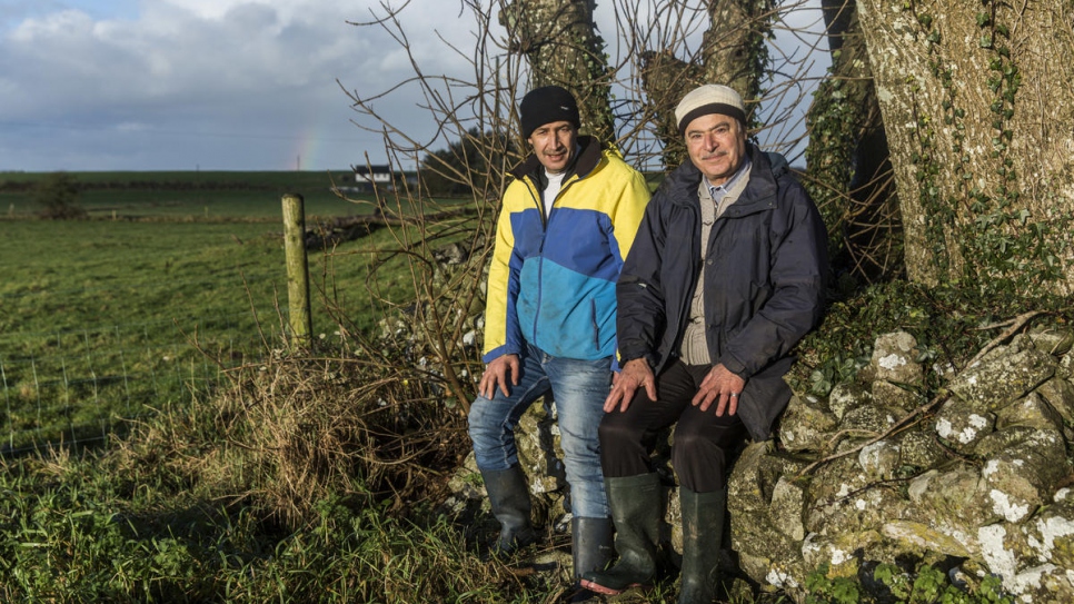 Faisal and Abdulhadi take a moment to rest on the farm in County Mayo.