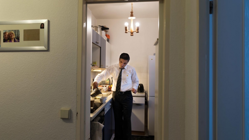 At home in Berlin, Mohamad gets ready to start another day on the buses.