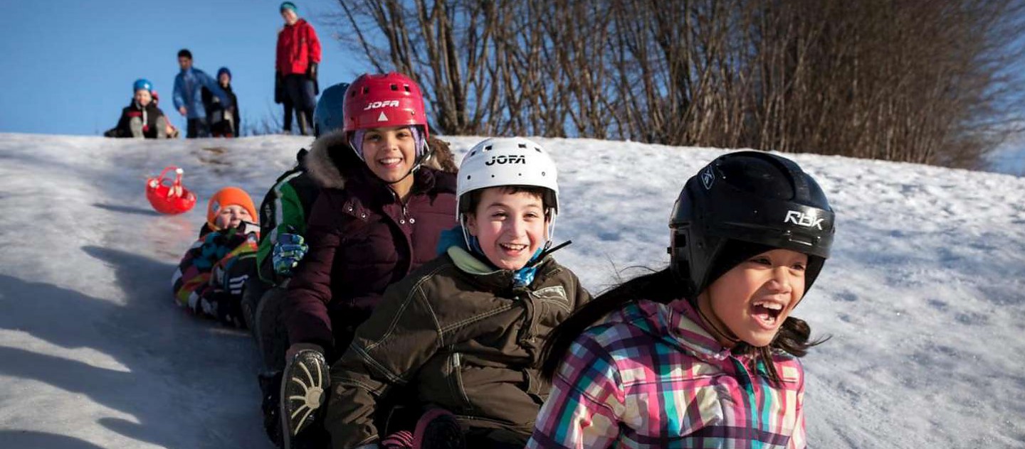 Sweden/ resettlement of Syrian refugees/ The Syrian family Farid has been living in Torsby, Sweden for one year. The oldest son Mahmoud have been going to school for one year in 4b at Holmesskolan in Torsby. Here he has learn Swedish and got many new swedish friends and schoolmates. During school break he and his friends plays at the icey slopes on the backside of the schoolyard. The family Farid consists of Dad Mohamed Farid, Mother Lina, oldest child Mahmoud, younger brother Mohamed and youngest sister Bisan. Torsby is a village in the outskirt of Sweden with a population of 12.000 citizens./ UNHCR / J. Bävman / February 2015. Background: Egypt / Syrian refugees / Syrian refugee Mahmoud Farid, 9-years-old, and his family had to flee from Syria to the Beit Al Aila neighborhood in the 6th of October City outside of Cairo, Egypt because of the war in their home country Syria. Mahmoud was detained by Egyptian authorities for 5 days after his father put him on a boat headed towards Italy with other Syrian refugees. The Egyptian coast guard officers allegedly opened fire and killed two people. According to his father, Mahmoud and his family face discrimination in Egypt and they live in a constant state of fear. Because they are without passports they are in a legal limbo. Mahmoud's father decided to send his son because he loves learning and he hoped that he might be able to go to school. Mahmoud was also attacked by a group of Egyptian children in the neighborhood. The family originally from Aleppo has been living in Torsby, Sweden for a year, UNHCR visit them again to see how they are doing and how life is on year later since they came. / UNHCR / J. Bävman / February 2015.