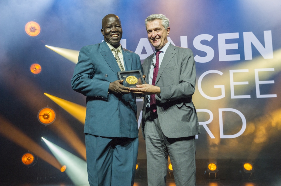 UN High Commissioner for Refugees, Filippo Grandi, presents the 2018 Nansen Refugee Award to Dr. Evan Atar Adaha, a surgeon and medical director at a hospital in north-eastern South Sudan.