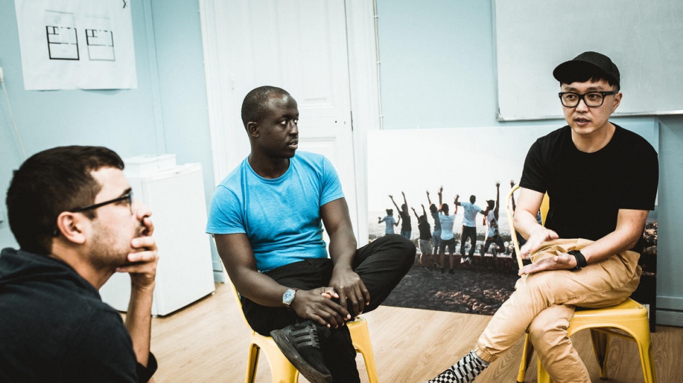 Dan Biswas (left), co-founder of the NGO Faros, trainer Roy Ombatti (centre) and Heewon Lee from the Massachusetts Institute of Technology's D-Lab discuss plans for the 3D workshop. 