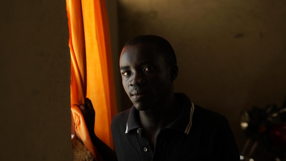 Richard Maliamungu, 23, hopes to open a business selling phones to fellow refugees.