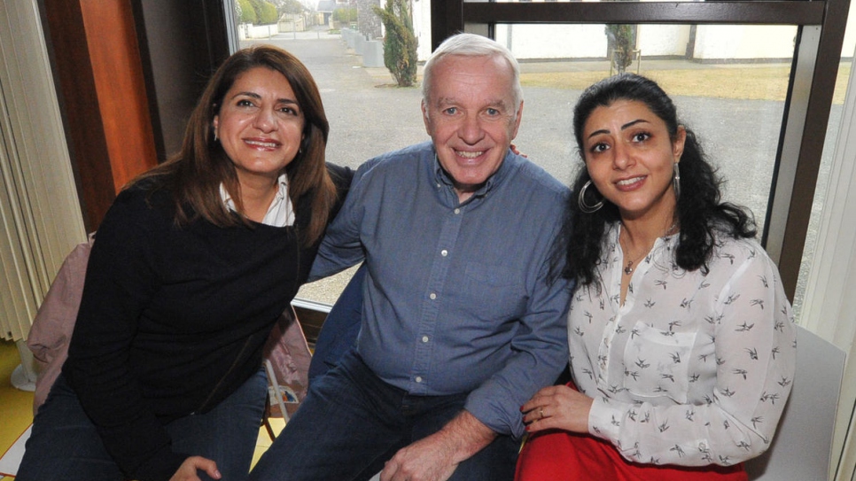 Syrian refugee Angham Fakhir (right) meets her neighbours Luma and John Farrelly at an event organised by a community sponsorship programme in Dunshaughlin, County Meath.