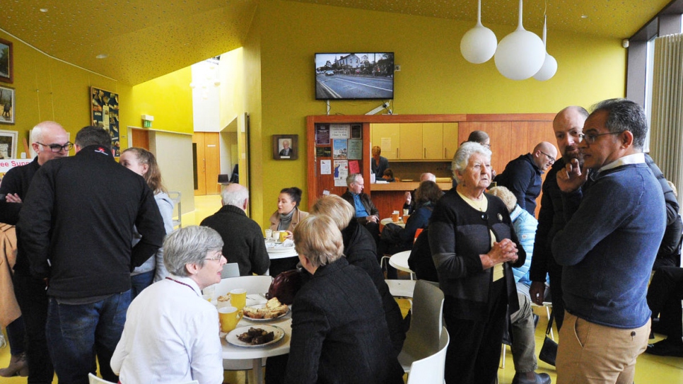 Syrian refugee Zuhair Fakir (right) meets some of his neighbours at an event organised by Nola Leonard (in white) to welcome his recently arrived family to Dunshaughlin, County Meath.