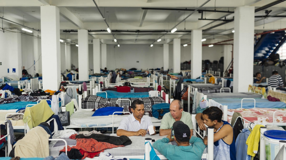 Gonzalez, a former owner of a construction company in Venezuela, revisits the Centro Transitorio de Acolhimento (CTA) in São Paulo.