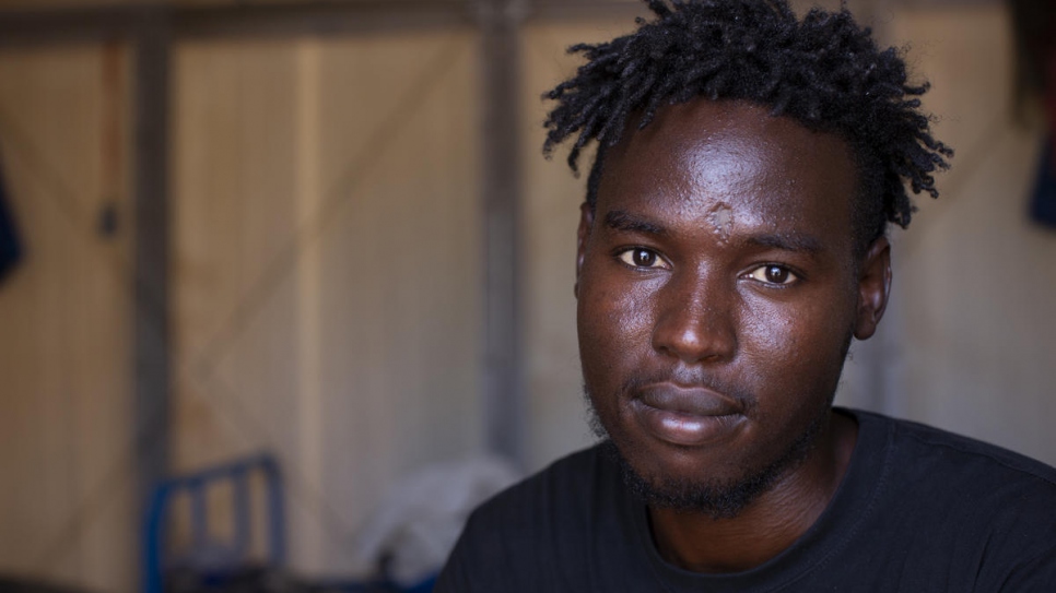Like Maryam,* Yasir is recovering at UNHCR's Emergency Transit Mechanism camp outside of Niamey, Niger. Yasir, a Sudanese asylum-seeker, was relocated to the camp following his illegal detention in Libya, where he was shot, routinely beaten, and humiliated.