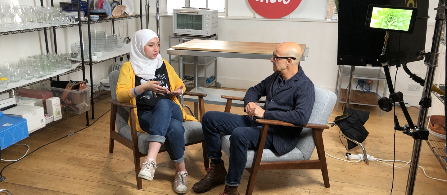 Stanley Tucci and Maya Ghazal on-set at Buzzfeed's Proper Tasty offices