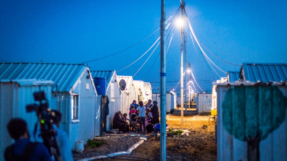 At last, Syrian refugees can enjoy the evening outside their shelters.