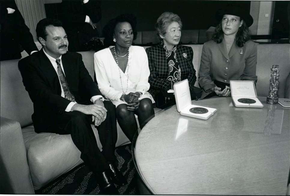 1991 - Libertina Appolus Amathila and Paul Weis.

After fleeing her native Namibia in 1962, Dr. Libertina Amathila studied medicine in Warsaw, London and Stockholm. She provided medical care in refugee settlements for nearly 20 years before she was repatriated by UNHCR in 1989. She was sworn in as Minister of Local Government and Housing on March 21, 1990, the night of Namibian independence. Amathila became Deputy Prime Minister of Namibia in 2005.

Paul Weis, a survivor of the Nazi concentration camps, shared the award posthumously. He escaped from Dachau and found asylum in Britain. As UNHCR's first Protection Director, he was called the "founding father of protection." The Vienna-born Weis was a strong advocate for refugees and worked constantly to remind the world of its responsibility towards them.
