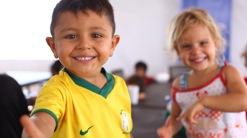 Venezuelan children arrive for meal time at the new reception centre in Maicao, Colombia.