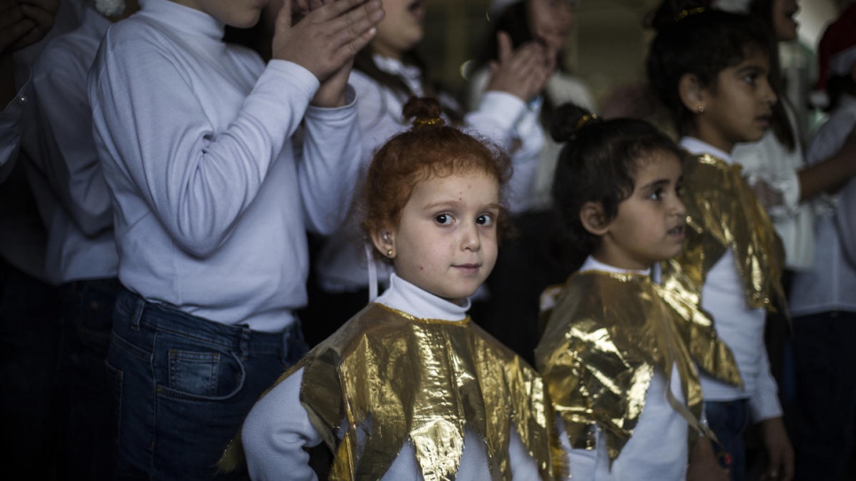 Four-year-old Maysa El Kheiry escaped the war in Syria in 2016. Two years later, she enrolled in the Father Andeweg Institute for the Deaf (FAID) school where she sings in the choir.