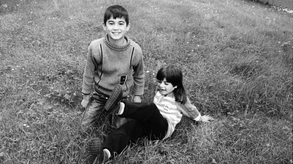 Mohamad and Ahmad play near their new home in Laval, France.