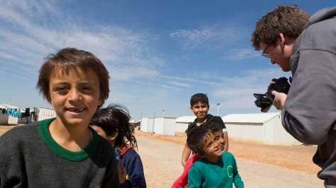 Jordan. UNHCR High Profile Supporter John Green in Azraq refugee camp