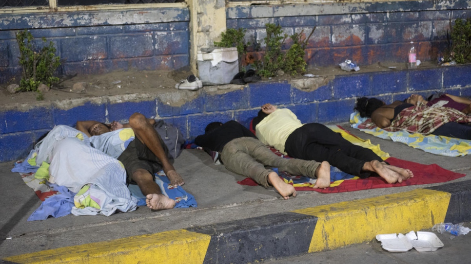 Venezuelan refugees and migrants sleep in front of the bus terminal in Maicao, Colombia. The conditions are highly insecure and have led to theft, assault and rape of the migrants.