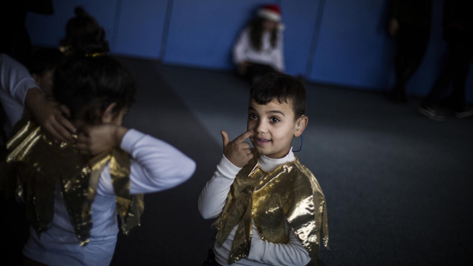 Mohammad, un jeune réfugié syrien de Palmyre, fait partie des choristes de Noël de l'institut FAID. 