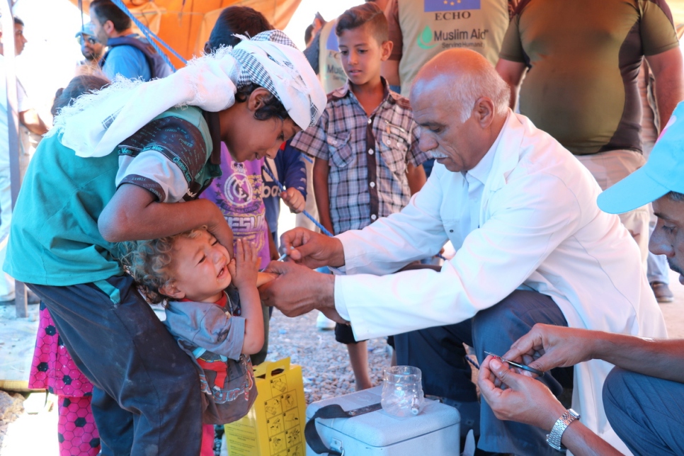 New arrivals are being vaccinated at Badoush mustering point in Iraq