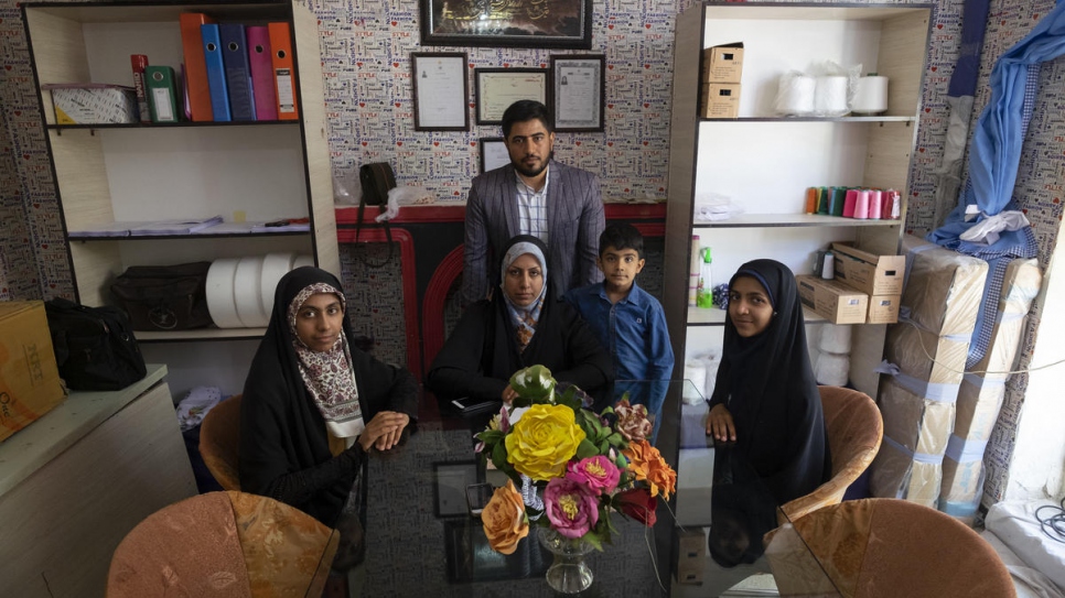 Zeynab (centre) with her husband and children at their home in Shiraz.