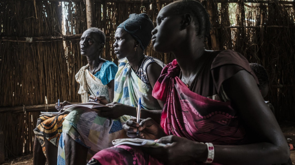 South Sudanese refugees sit in a classroom in a private tuition school for adults at Jewi Refugee Camp in Gambella, Ethiopia.