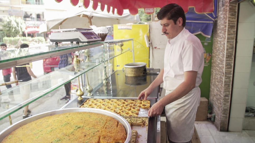 A selection of sweet pastries on display outside the family's shop in Giza, Egypt.