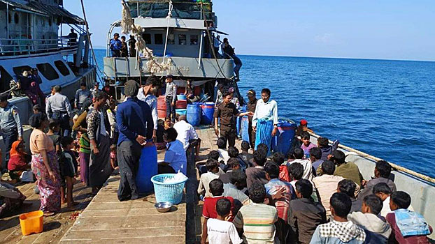 Myanmar authorities seize a boat carrying Rohingya Muslims from Rakhine state en route to Malaysia, off the coast of Dawei district in southern Myanmar's Tanintharyi region, Nov. 25, 2018.