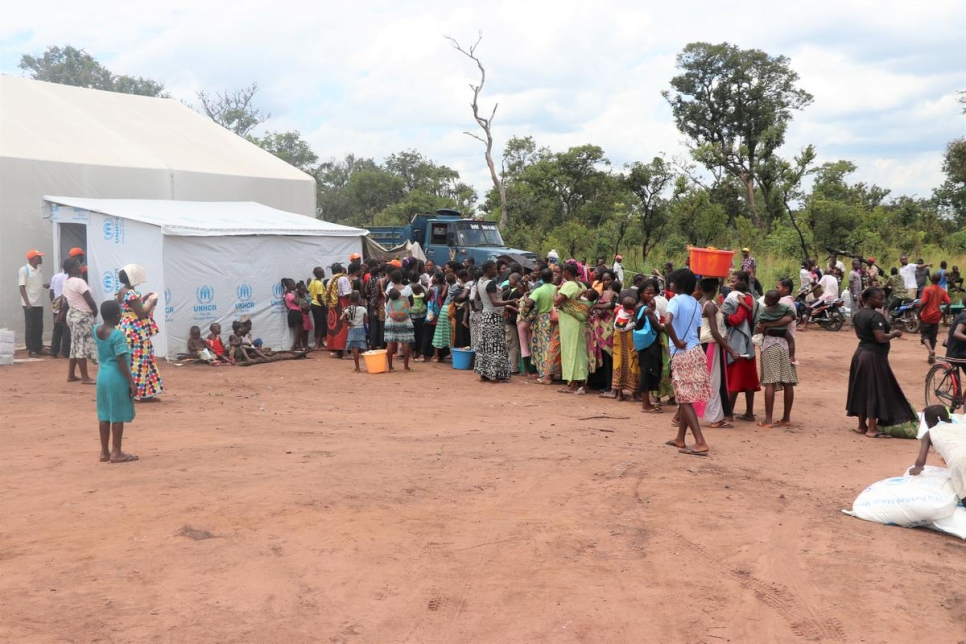 Angola. Parents waiting for the screening of their children