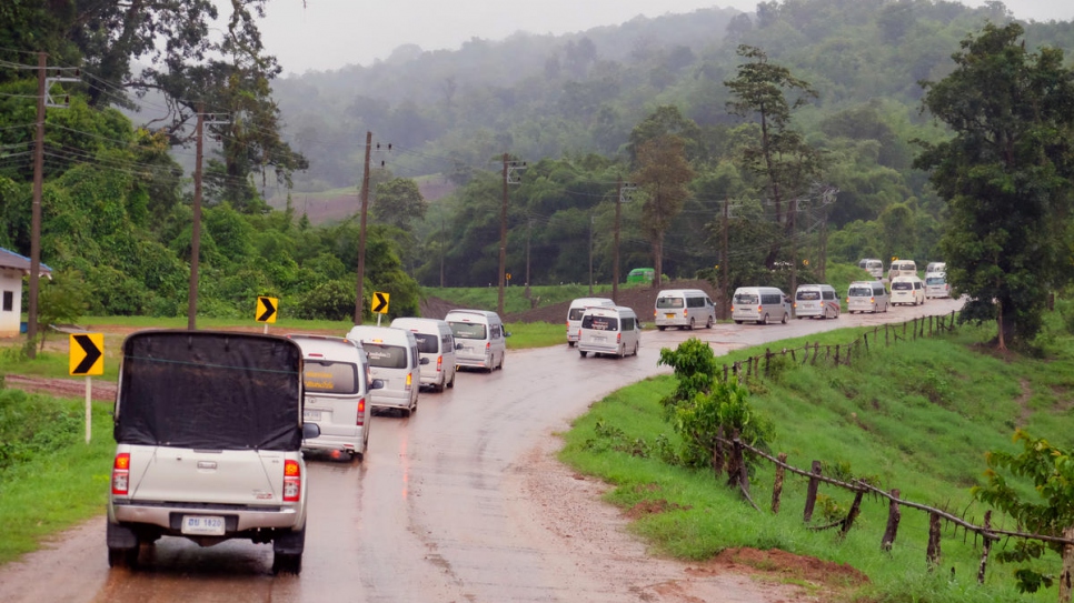 A convoy of vehicles carrying refugees from Myanmar departs from Nu Po temporary shelter in Umphang district, Tak province, western Thailand.