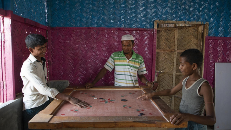 Young Rohingya refugees play carrom, a South Asian board game in Kutupalong refugee settlement, Bangladesh.