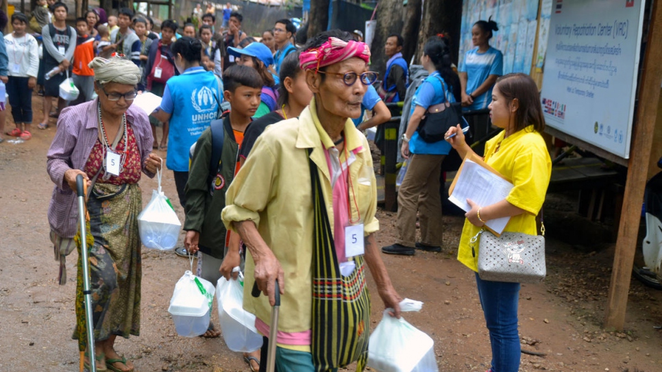 Refugees from Myanmar leave Mae La temporary shelter in Tha Song Yang district, Tak province, western Thailand.