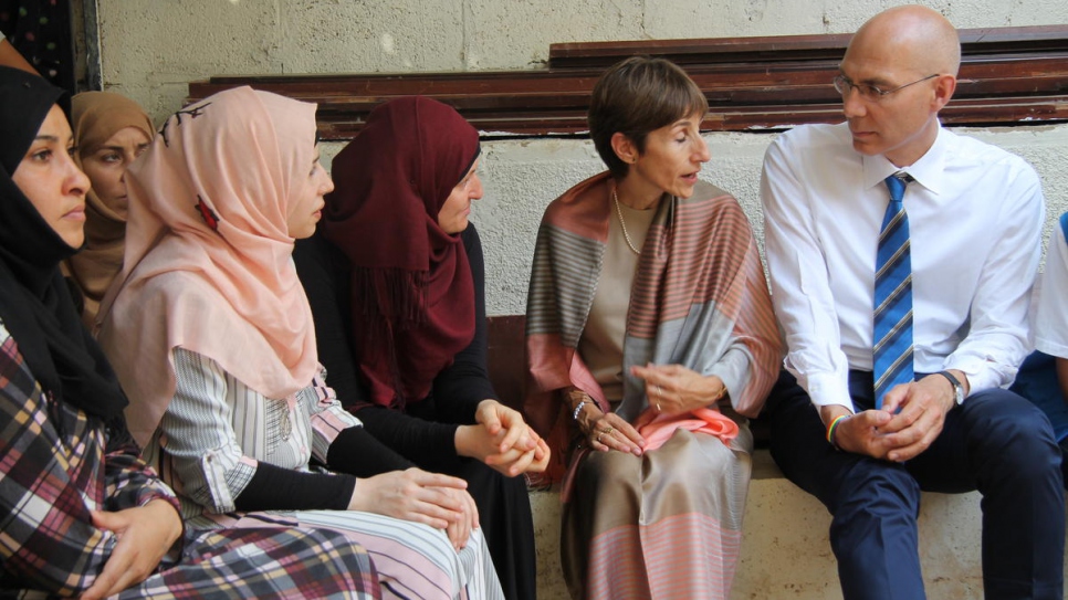 UNHCR Assistant High Commissioner for Protection, Volker Türk and UNHCR representative to Lebanon Mireille Girard meet a group of Syrian refugee women.