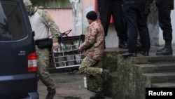 A Ukrainian sailor captured by the Russian FSB leaves a court in Simferopol, Crimea, on November 27.