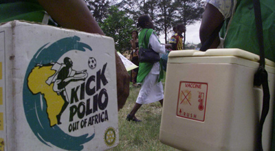 Health care workers gather to administer polio vaccines in Nigeria. (AP/George Osodi)