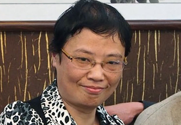 Rights activist Hou Xin, who posted a tweet urging justice for Lei Yang, is shown in an undated photo.