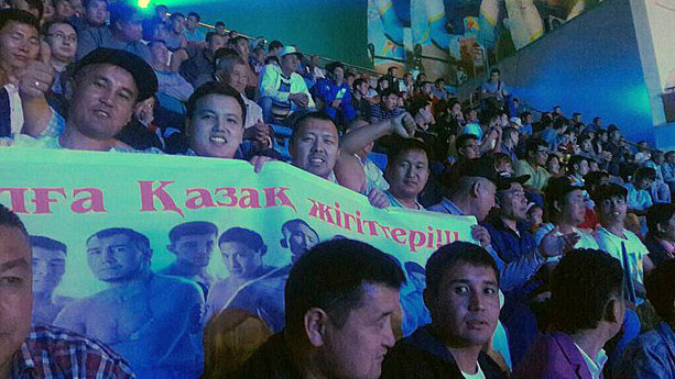 Supporters cheer Kazakh boxer Kanat Islam in Astana, Kazakhstan, Sept. 9, 2017.