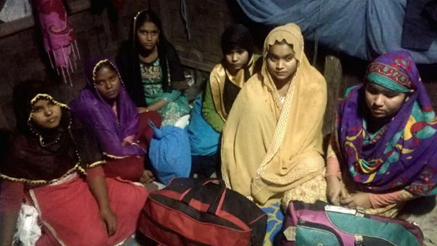 Bangladesh Rapid Action Battalion officers rescued these six Rohingya women in Cox's Bazar from an alleged trafficker, Nov. 30, 2018.