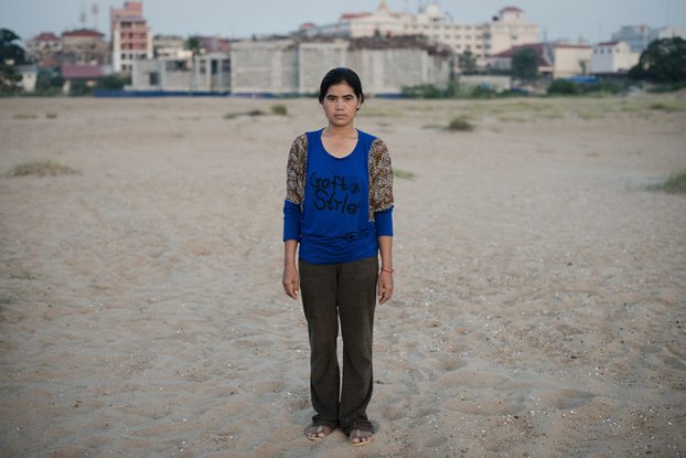 Tep Vanny, of the Boeung Kak lake area posed for a photograph of the filled in lake, Oct. 19, 2012.