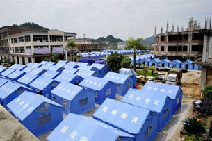 Tents form a refugee camp near the border separating China and Burma, in the Chinese border town of Nansan, Aug. 31, 2009.