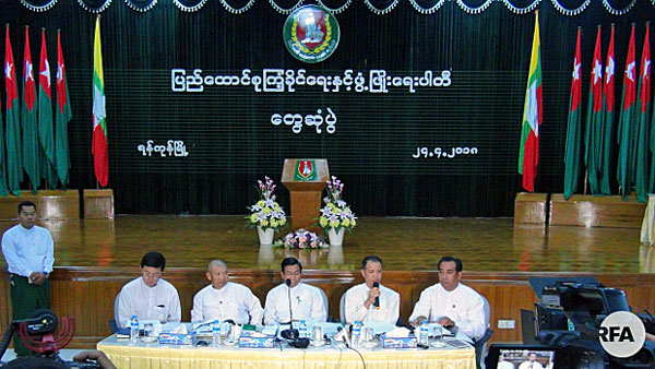 Members of the Union Solidarity and Development Party hold a press conference to express their opposition to the lifting of travel restrictions on Rohingya Muslims with National Verification Cards, in Yangon, April 24, 2018.