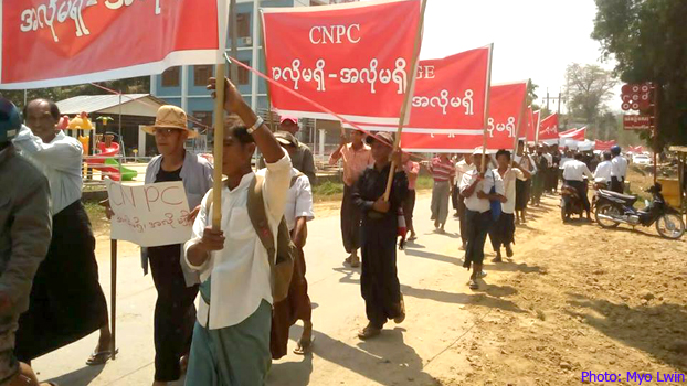 Myanmar protesters demand compensation for land confiscated by the Chinese and Myanmar operators of a pipeline project in Ann township, western Myanmar's Rakhine state, March 22, 2018.