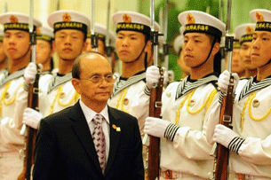 Burma's President Thein Sein inspects a military parade during a visit to Beijing, May 27, 2011. The former general has not forged ahead with democratic reforms.