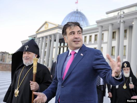 Karekin II (left), the head of the Armenian Apostolic Church, walks with Georgian President Mikheil Saakashvili (center) and Georgian Orthodox Church Patriarch Ilia II in Tbilisi in June.