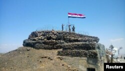 Syrian forces of President Bashar al-Assad on al-Haara hill in the Quneitra area.
