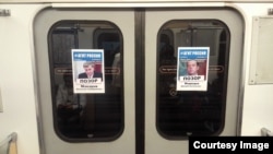 Posters in the St. Petersburg subway calling out members of the 'Shameful Regiment.'