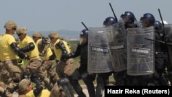 The NATO led-peacekeeping force KFOR and Kosovo Police conduct a joint crowd- and riot-control drill in Pristina.