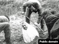 An Iranian woman being prepared for a stoning in the 1980s.