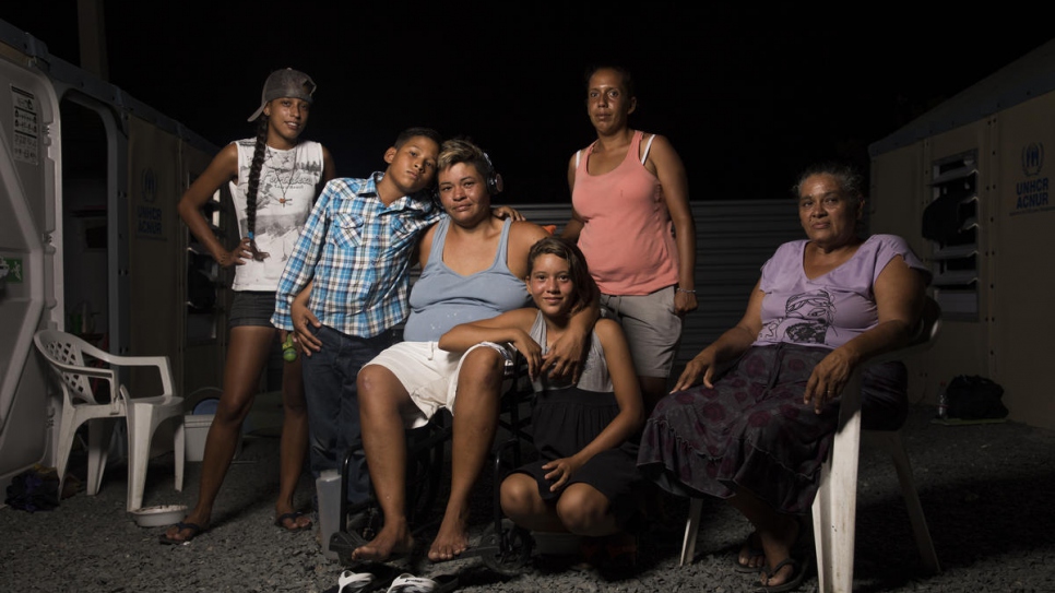 Moisés' family with his sister Valentina in Rondon 3 shelter in Boa Vista, Brazil.