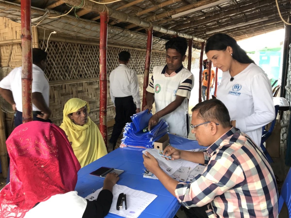 Bangladesh. UNCHR Associate Registration Officer Thais Severno helps register Rohingya refugees