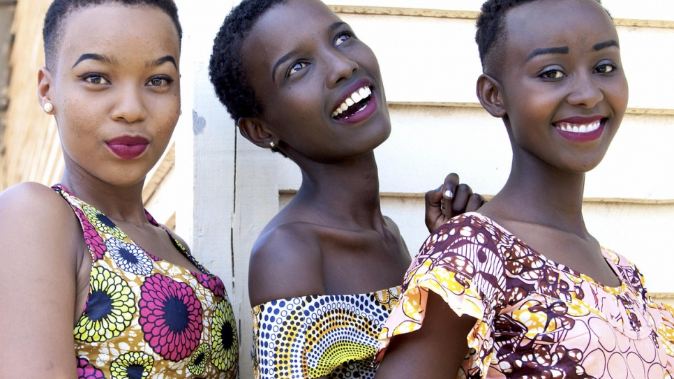 Helena Christensen travelled with UNHCR to Rwanda to meet Burundian refugees and learn more about one of the world's most underfunded refugee crises. This is one of a series of portraits Helena captured of the individuals she met in Mahama refugee camp. 

Leatitia, Elvira and Giselle (from left to right) are all models with Top Family Models Agency and they were walking in a fashion show in Mahama Camp alongside UNHCR's High Profile Supporter Helena Christensen.