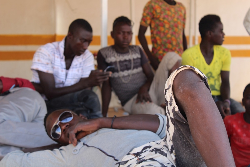 Niger. Youth from Agadez hanging around at the bus station, awaiting the arrival of possible migrants from whom they may earn some income