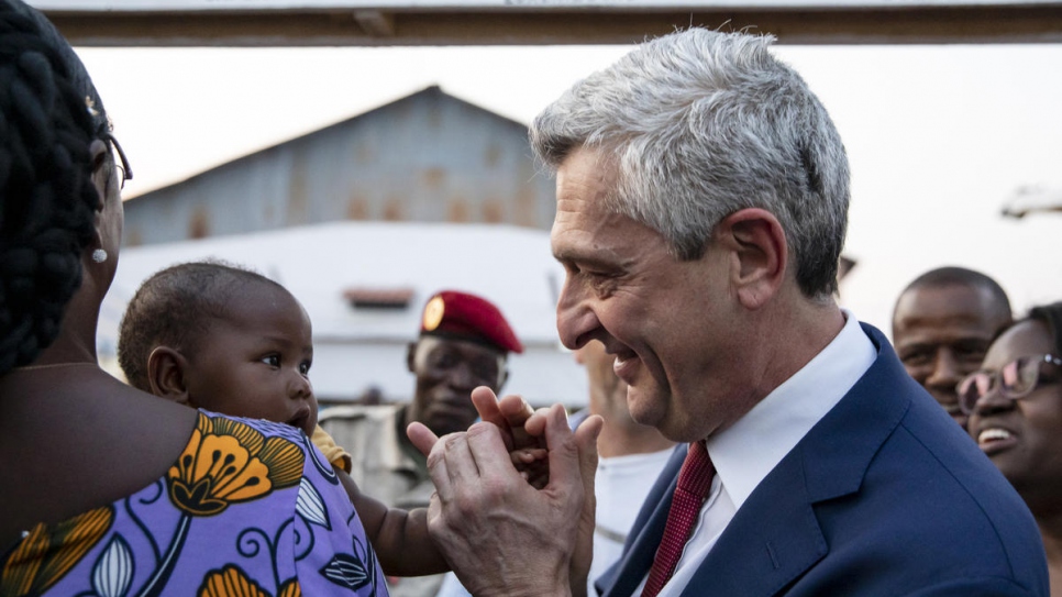 UN High Commissioner for Refugees Filippo Grandi talks to returning refugees in Bangui, the Central African Republic.