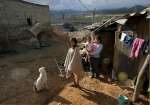 An IDP family living in dire conditions in the <em>barrio</em> of Los Altos de la Florida, just outside Bogota.